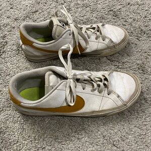 Nike White and Gold Athletic Shoes